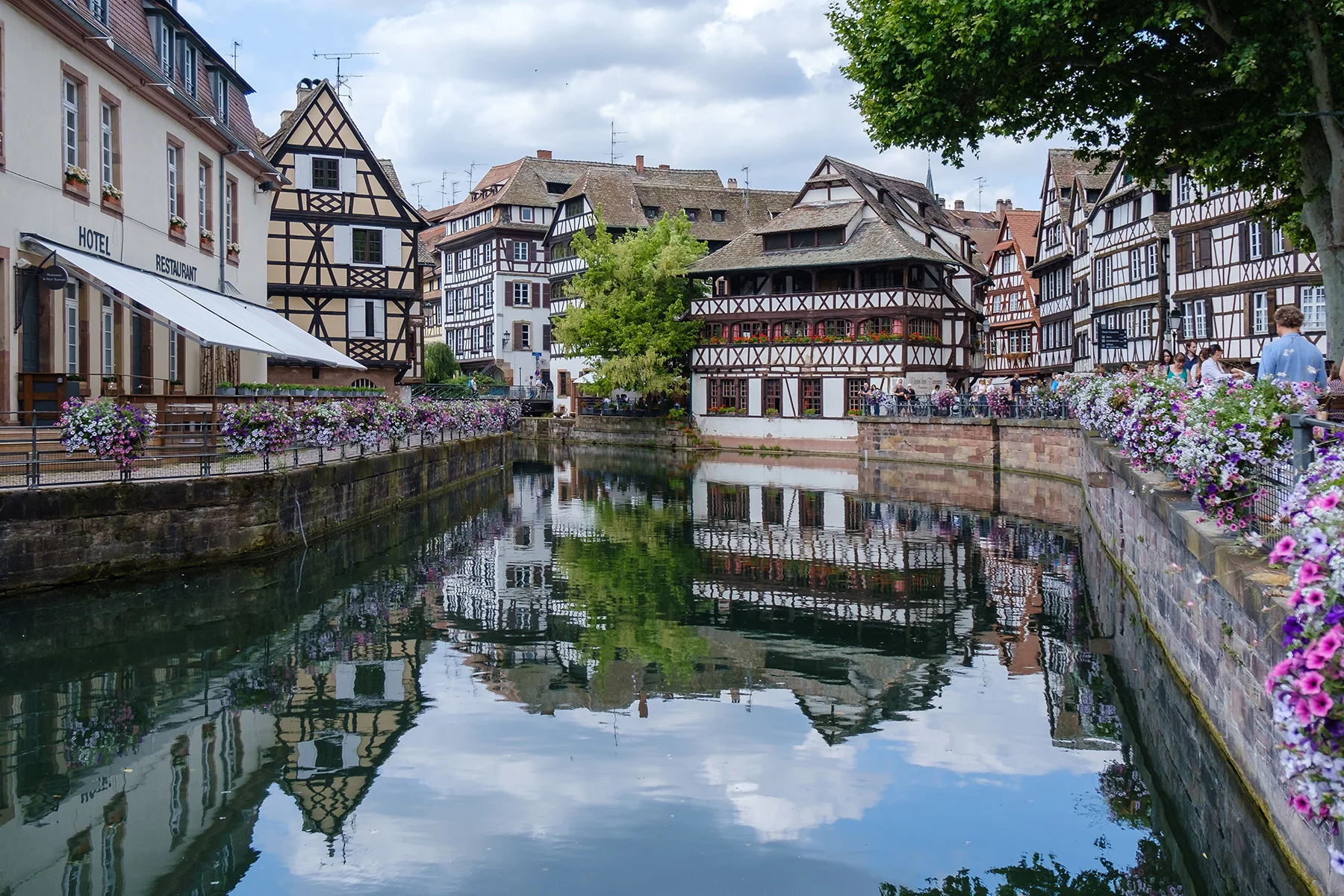 A river running through Strasbourg with houses either side