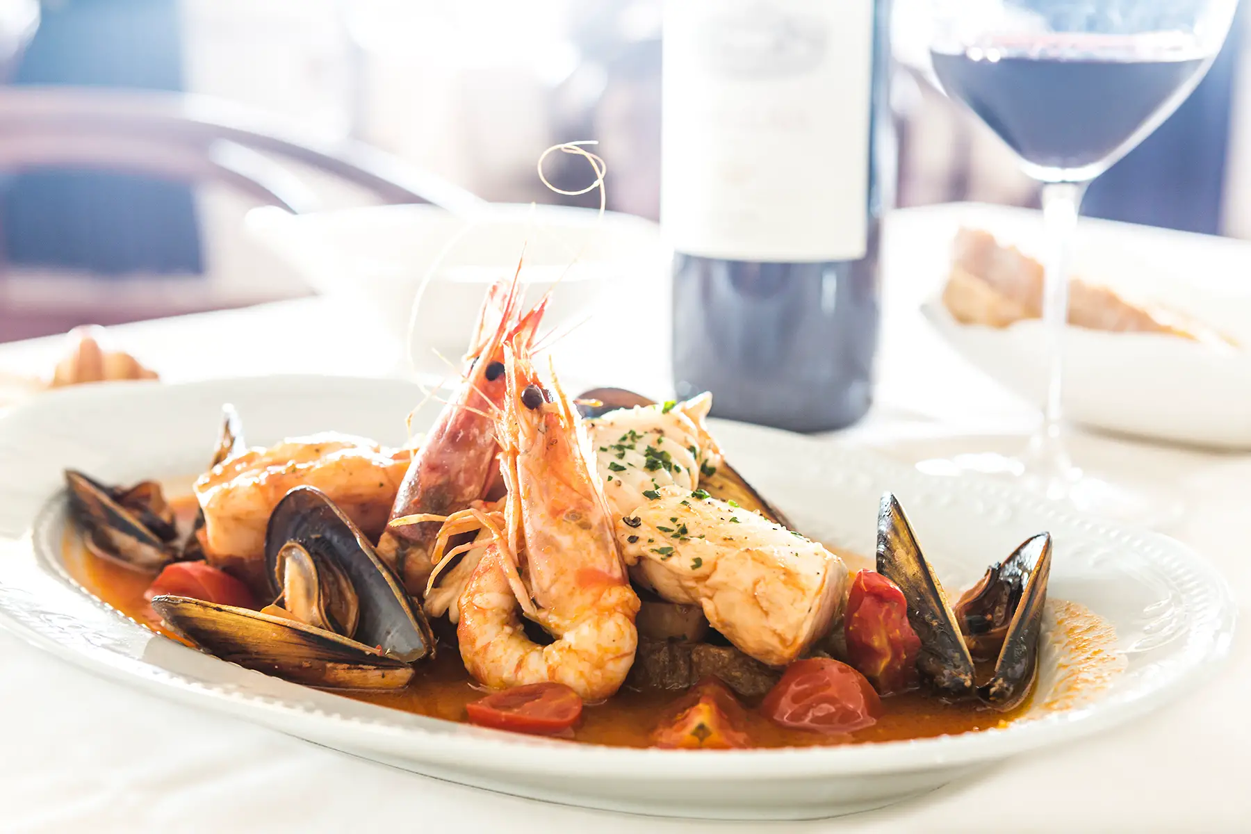Cacciucco – seafood in a dish in a red sauce