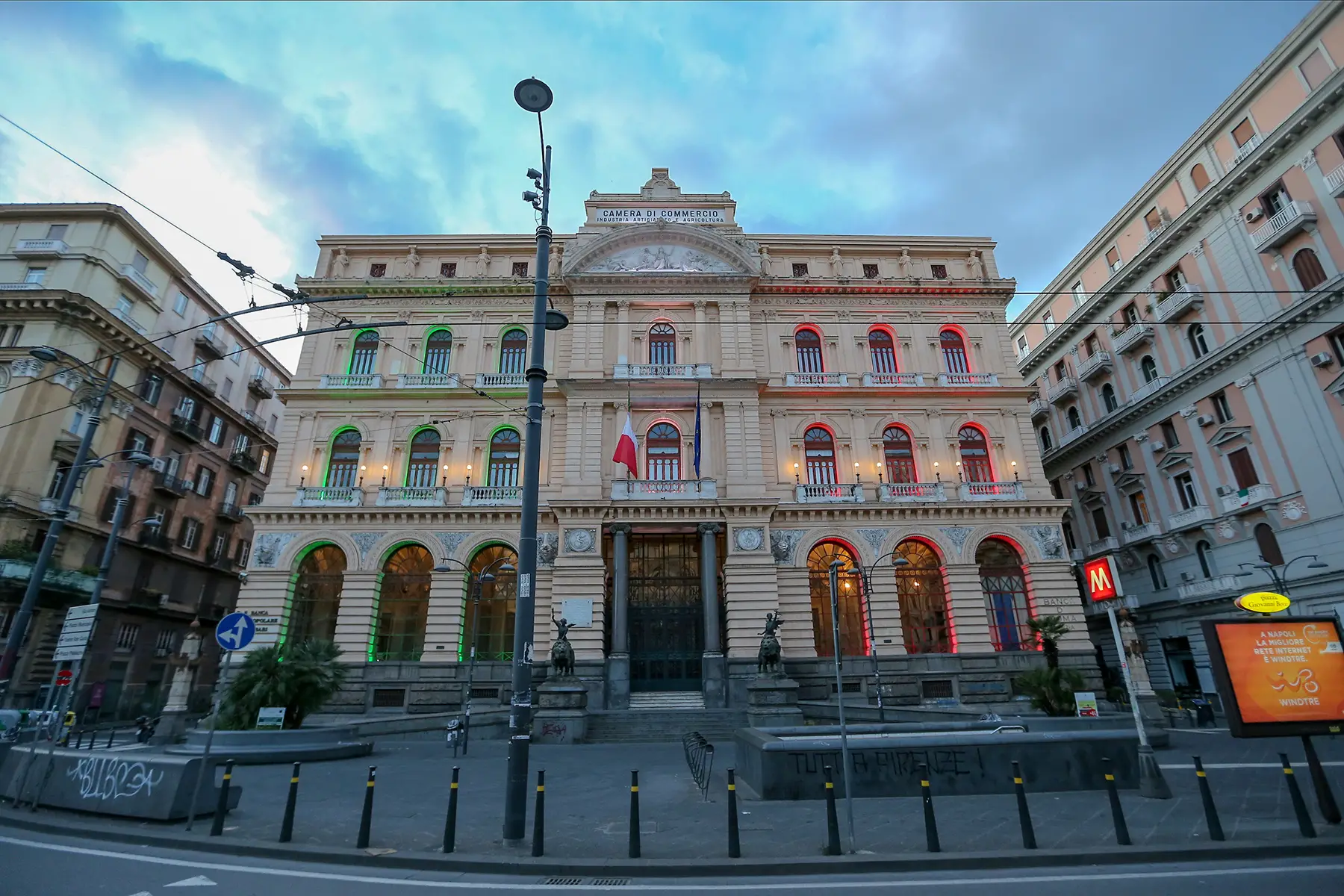 Chamber of Commerce Building in Naples. A grand old building illuminated with the colors of the Italian flag