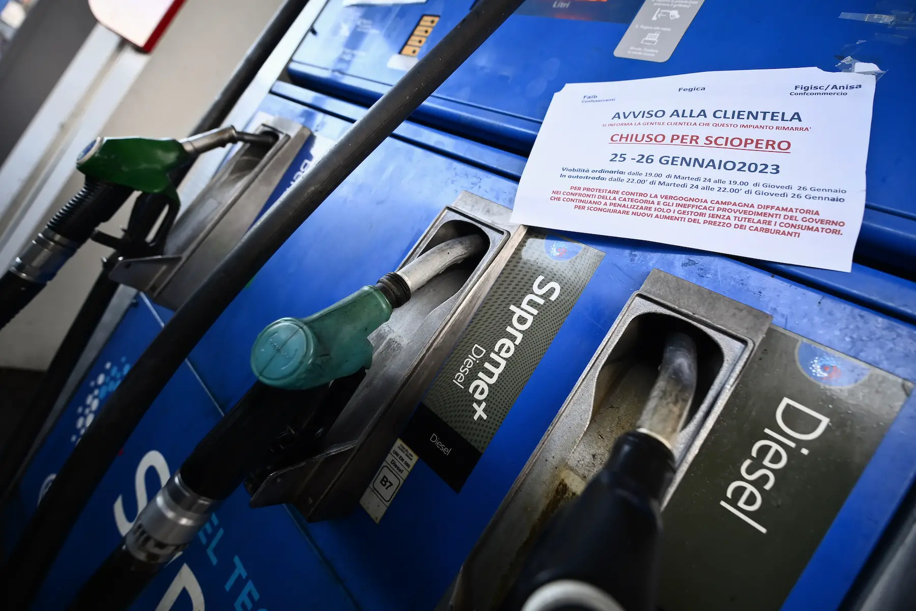 A piece of paper taped to gas pumps at a Torino gas station warns customers that the station will be closed for a strike