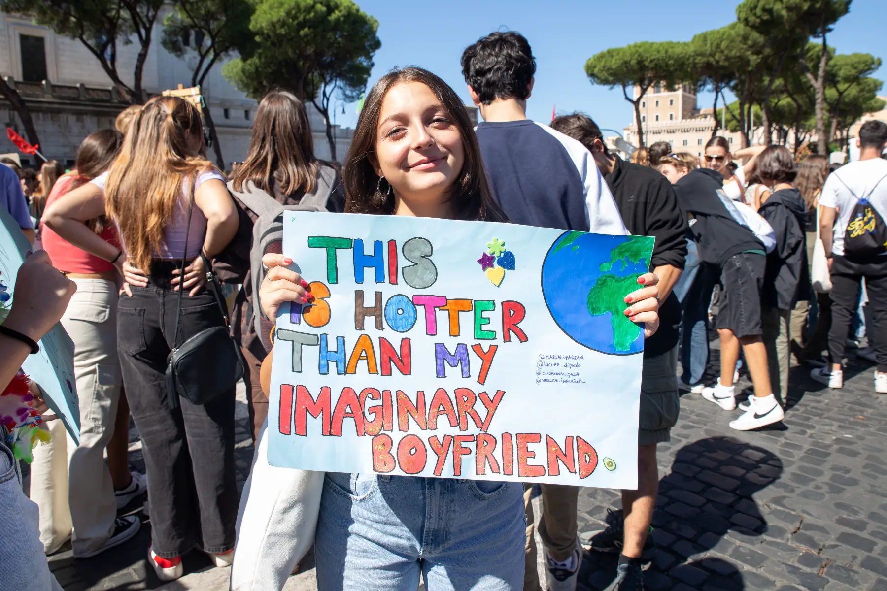 Protester with sign at climate protests in Italy, 2022 Climate Demonstration organized by Fridays For Future Italy in Rome, Italy 