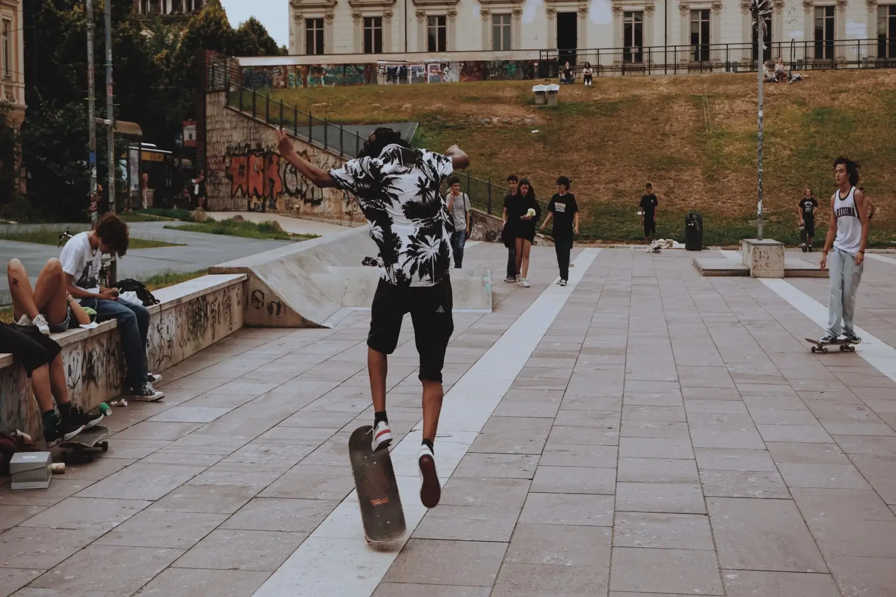 Skateboarders doing tricks in Torino