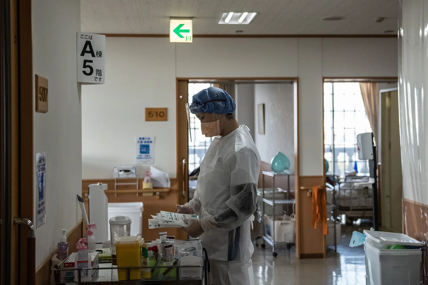 Nurse checking covid tests at a hospital in Japan