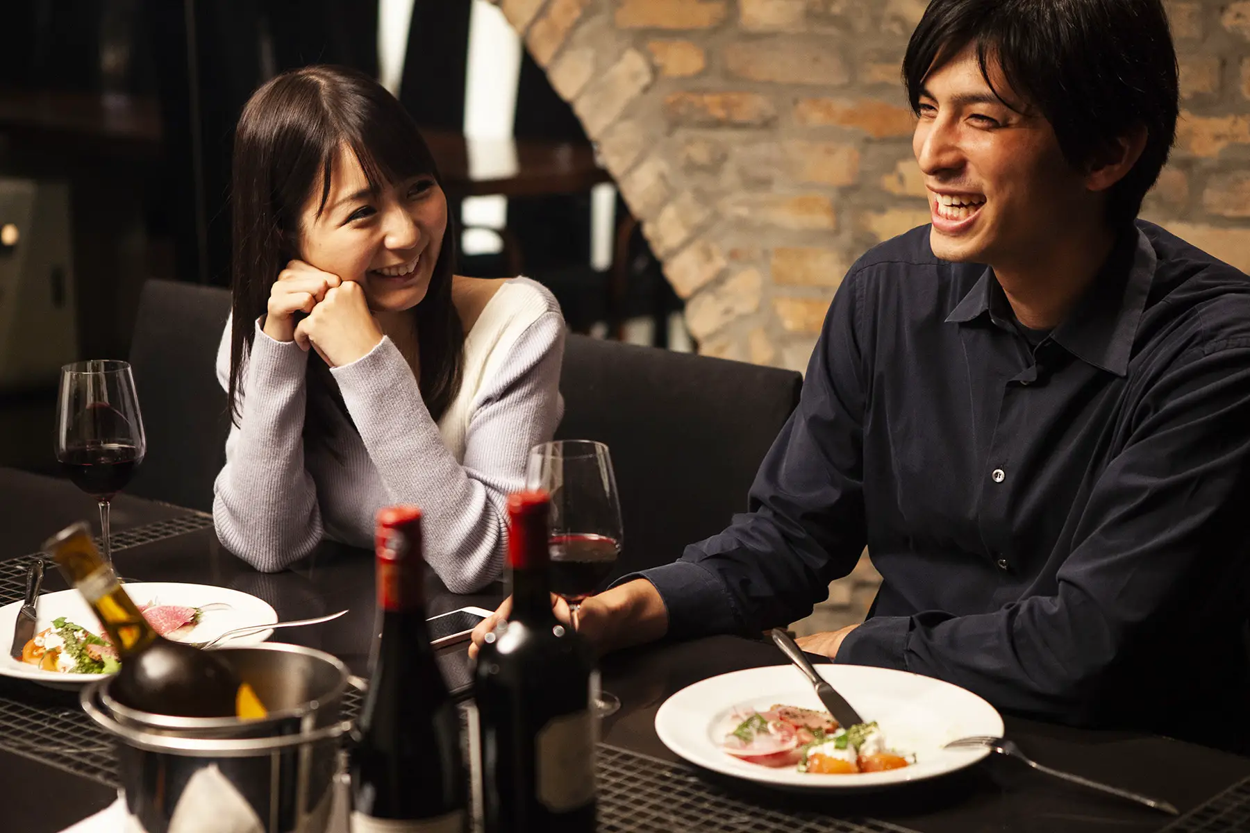 Japanese couple on a date at a restaurant