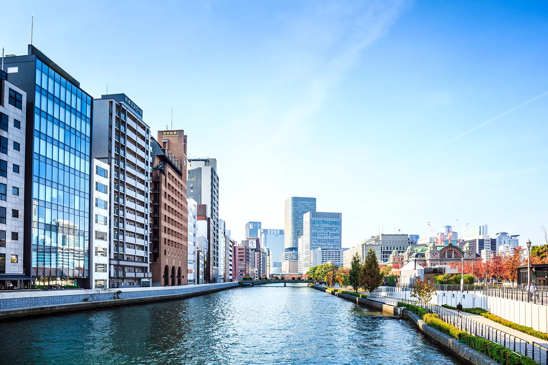 A canal in Osaka city in Japan on a sunny autumn day