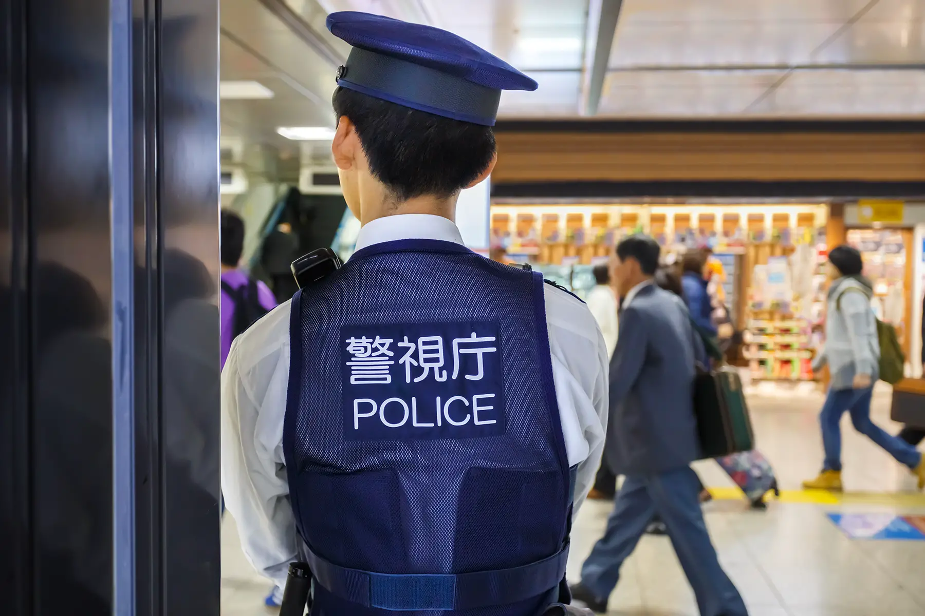A police officer standing at Tokyo Station