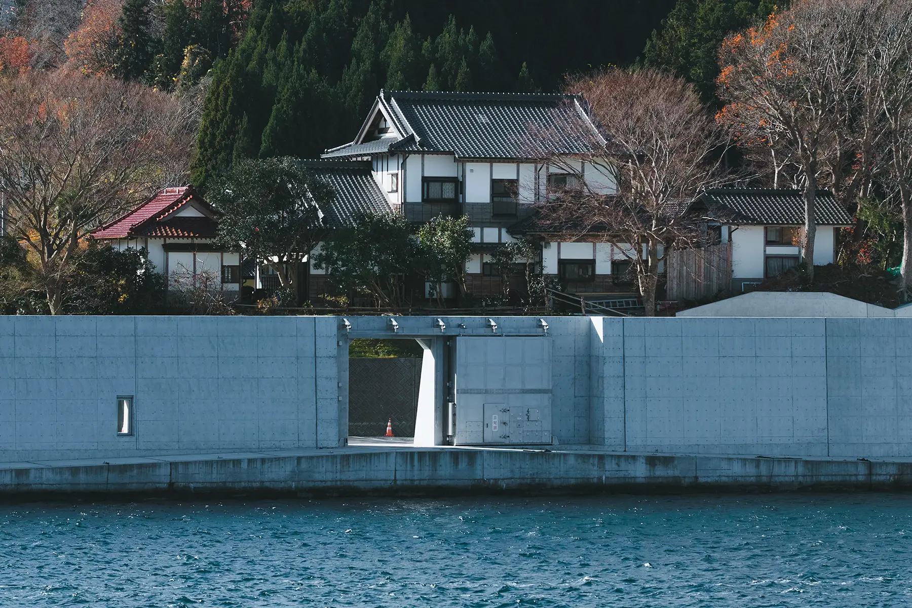 A house behind a sea wall in Iwate