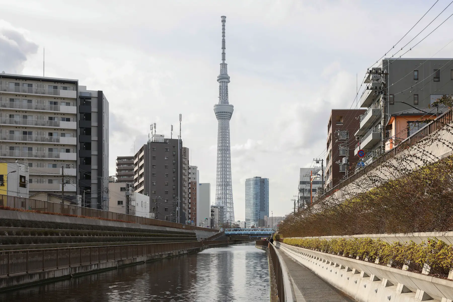 A view of the Tokyo Skytree radio and television broadcasting tower which stands high in the sky on a cloudy day