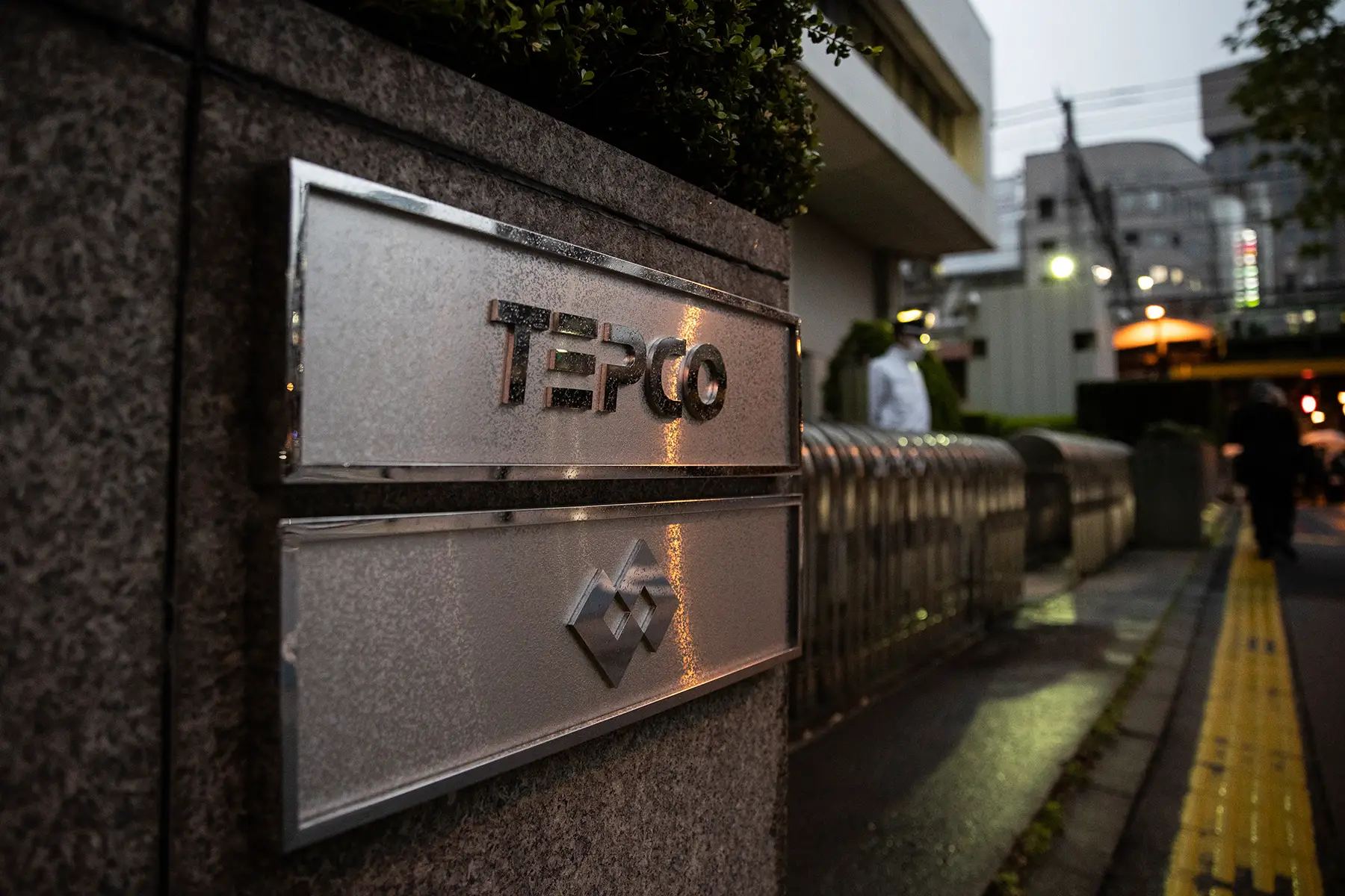 Tokyo Electric Power Company Holdings, Incorporated (TEPCO) logo is displayed outside the company's headquarters