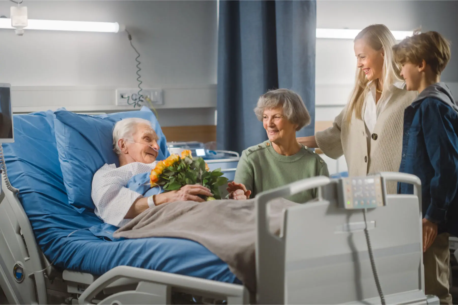 visiting hours at hospitals in Luxembourg: elderly patient getting flowers from family
