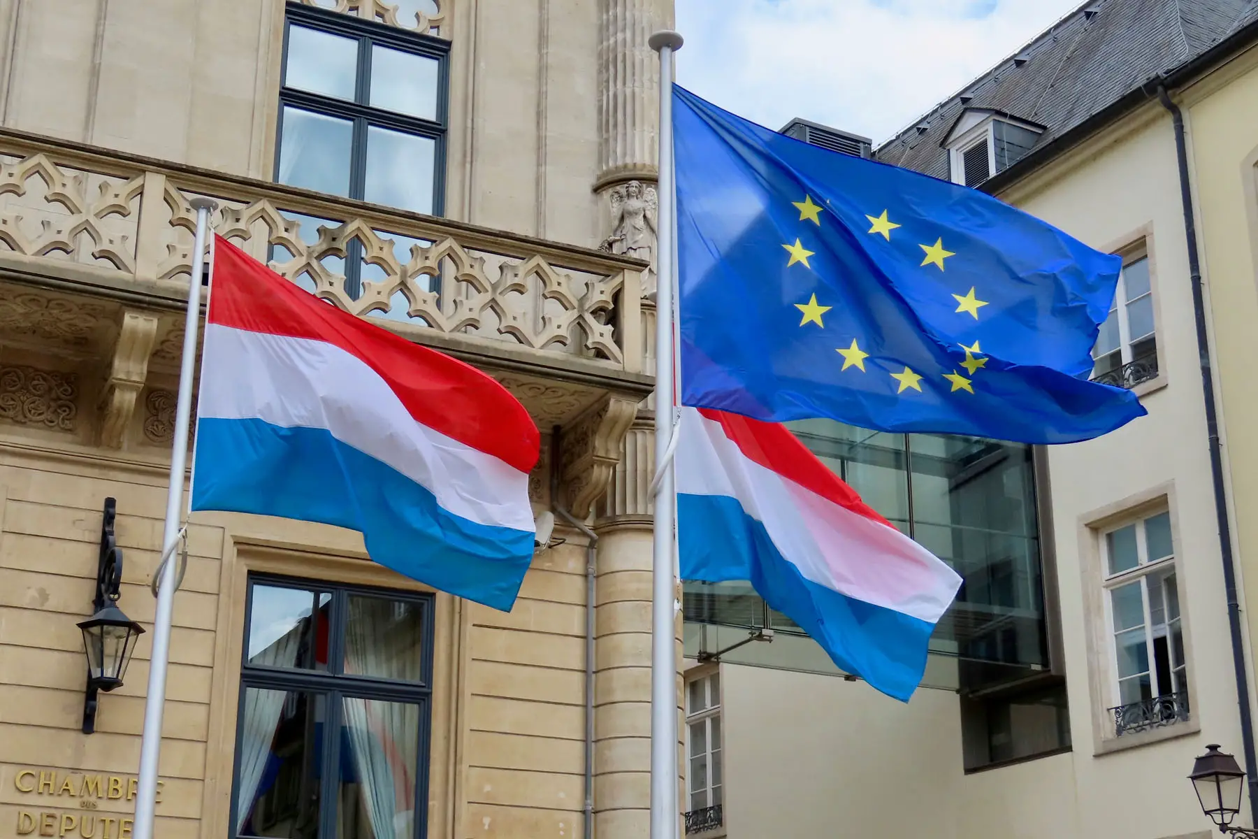 EU and Luxembourg flags fly at full mast at the Chamber of Deputies  