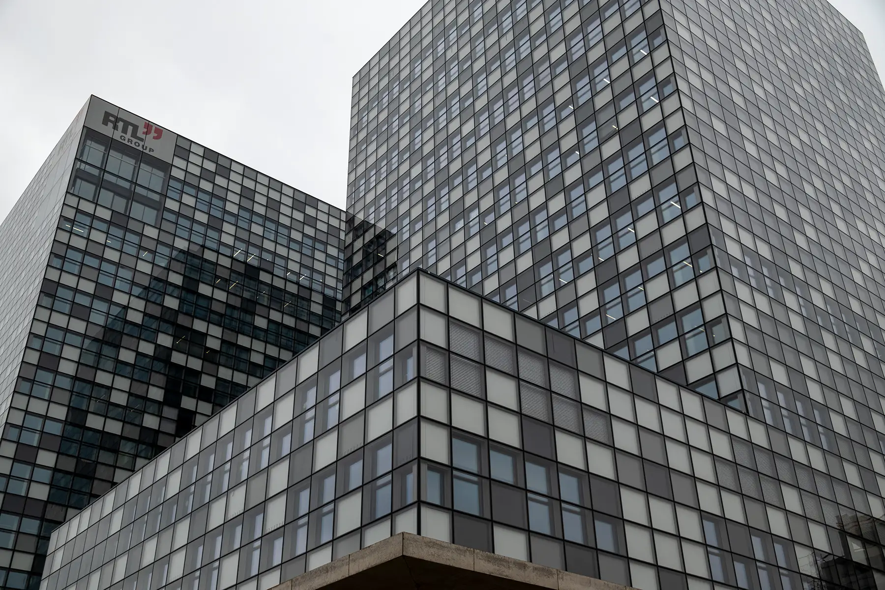 RTL headquarters in Luxembourg: a large skyscraper with three towers, covered in square windows