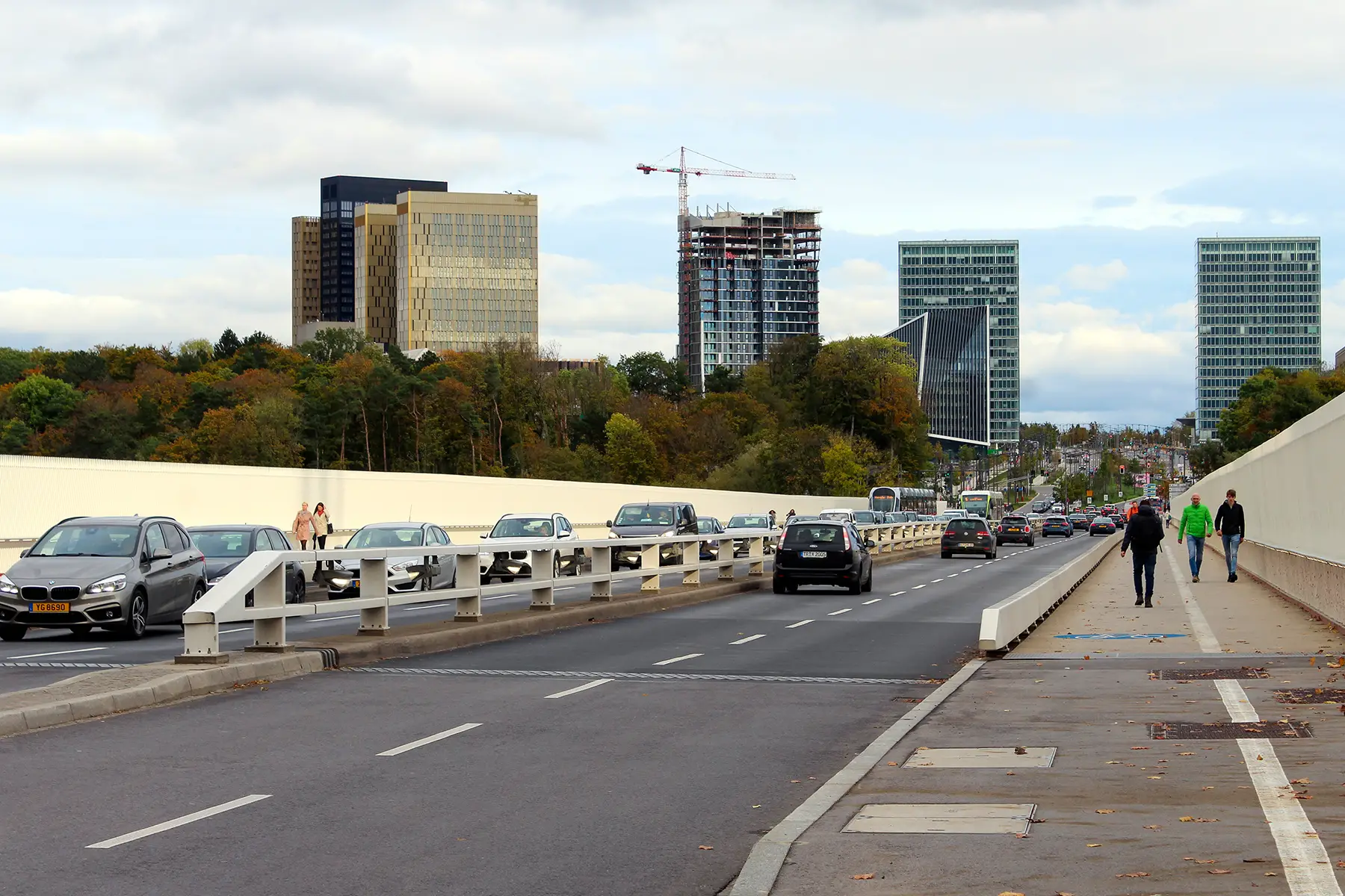 Traffic on the Red Bridge in Luxembourg, skyscrapers in the background