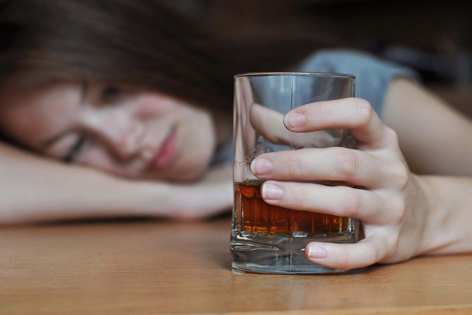 a woman struggling with alcohol addiction