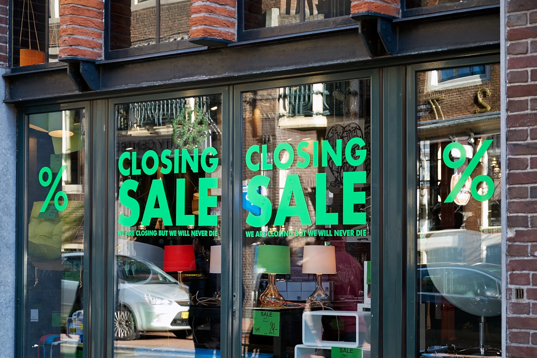 Closing sale signs in an Amsterdam store window
