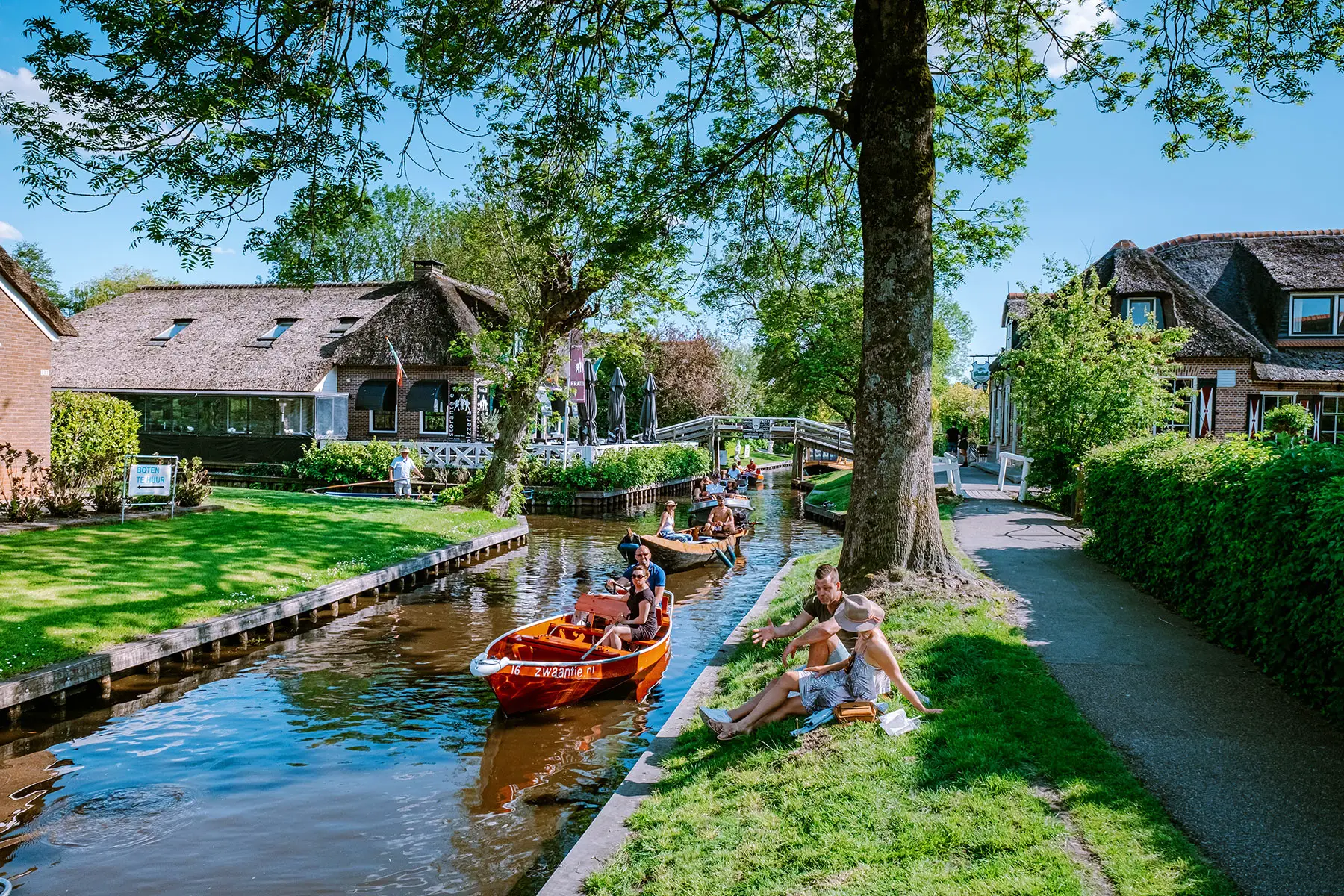 People in boats on a Dutch canal