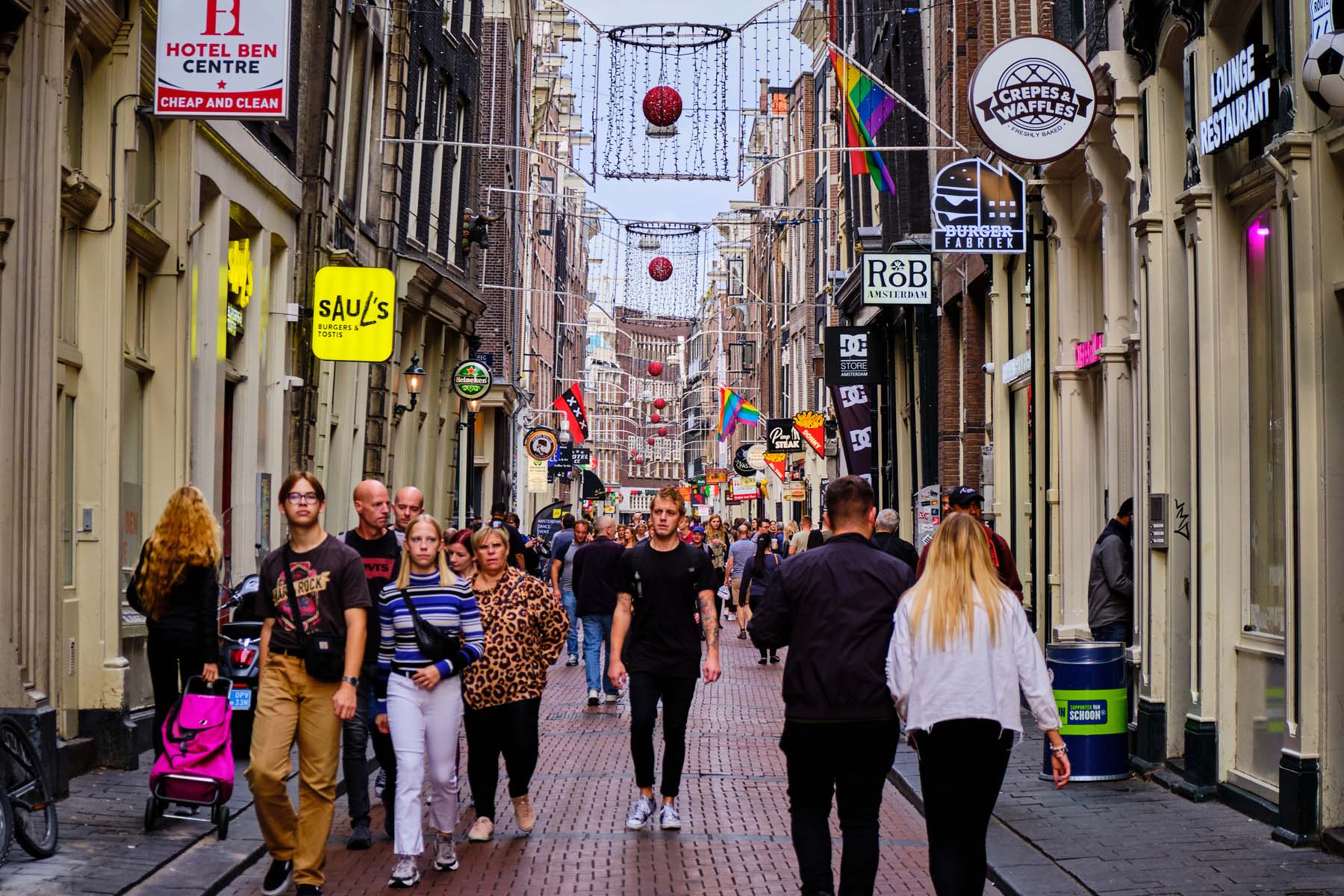 busy shopping street in De Wallen, Amsterdam Centrum