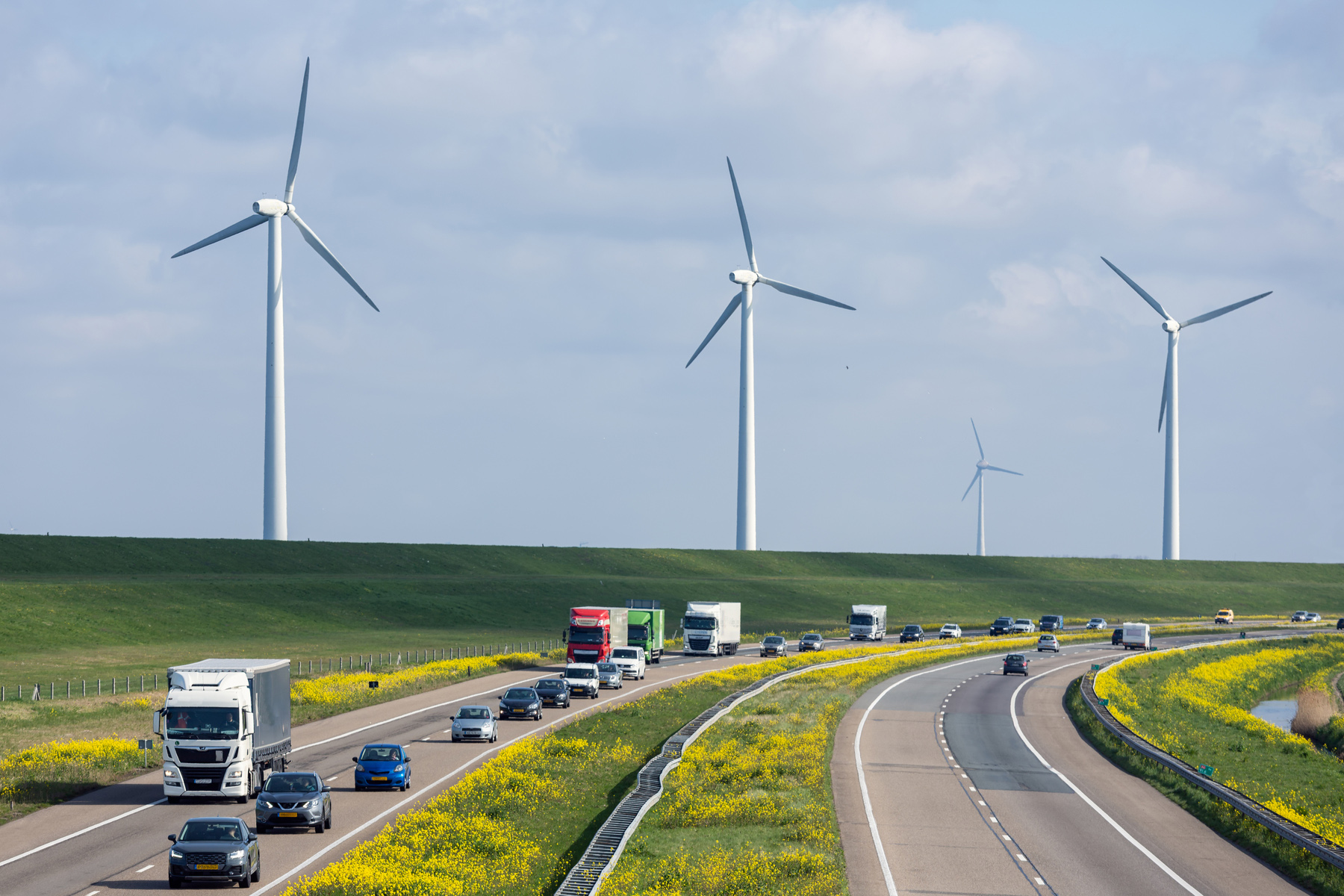 dutch motorway with wind turbines