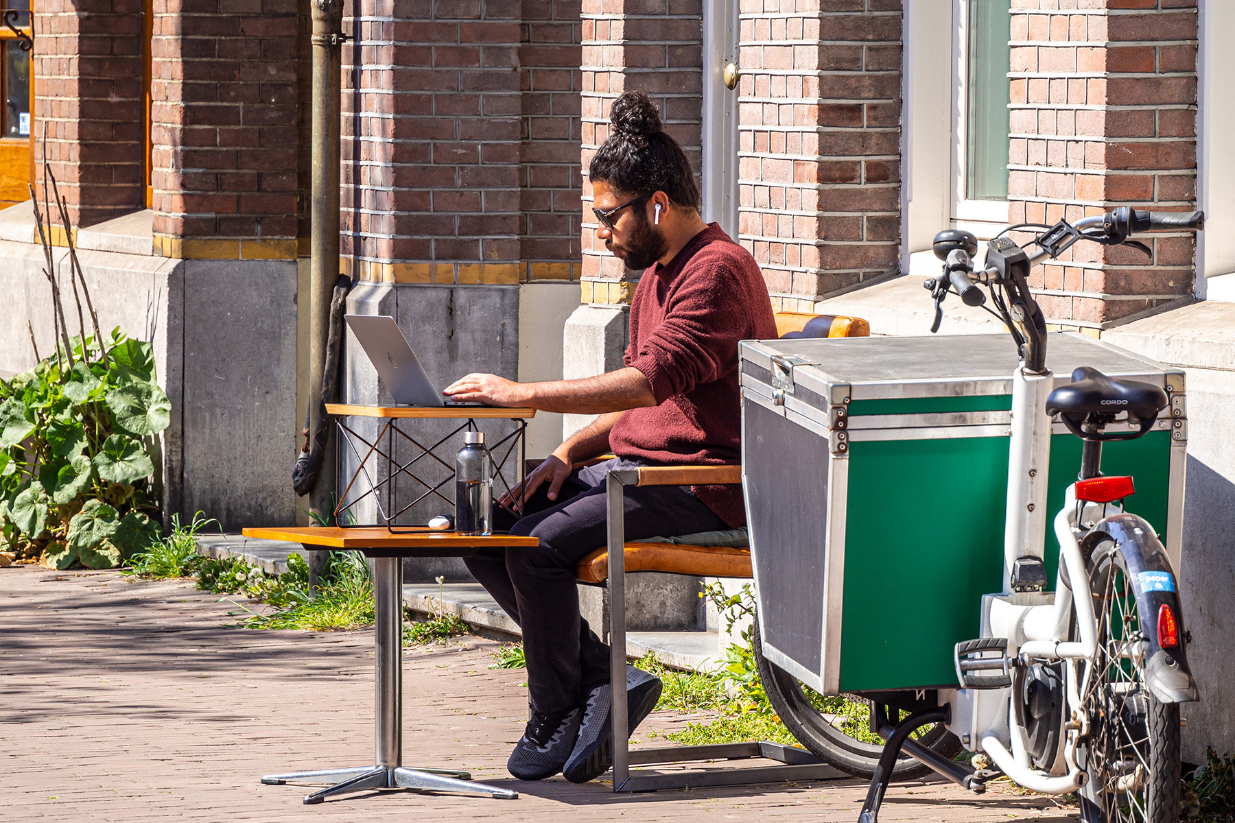 Freelancer working on his laptop in Amsterdam