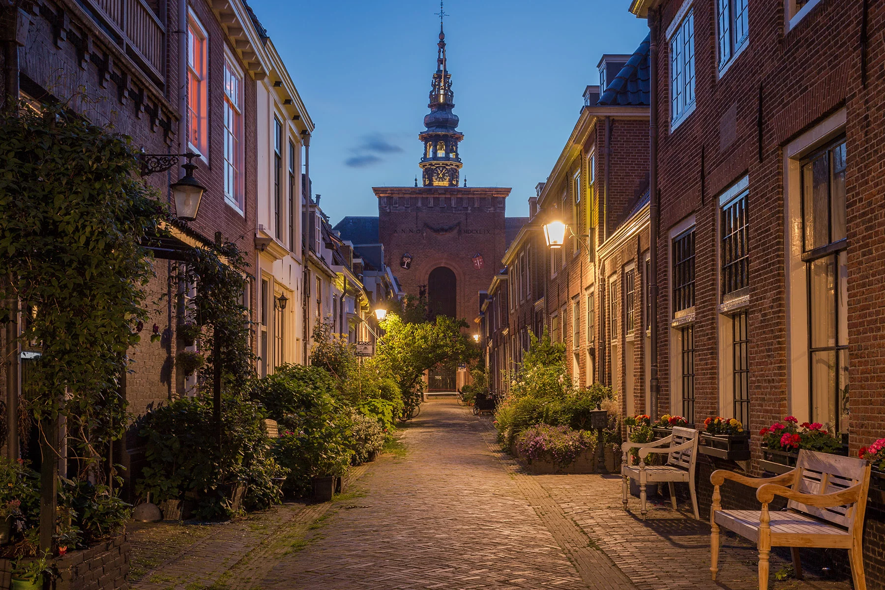 Quaint street in the city center of Haarlem at dusk