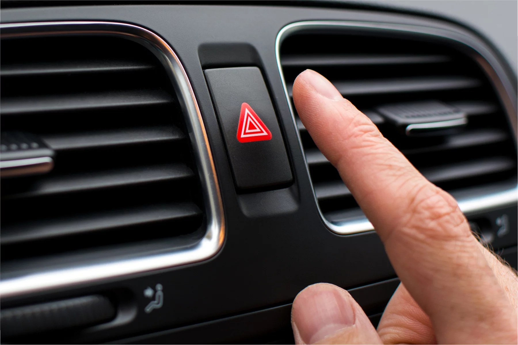 pressing the hazard light in a car