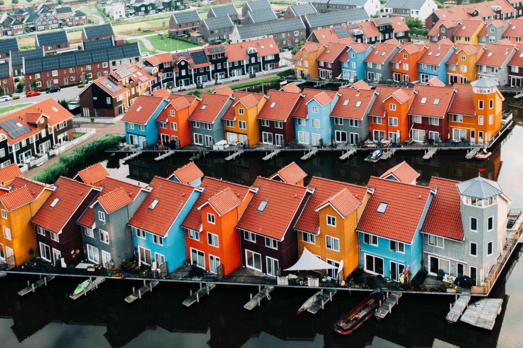 Colorful houses stand along the marina in Groningen
