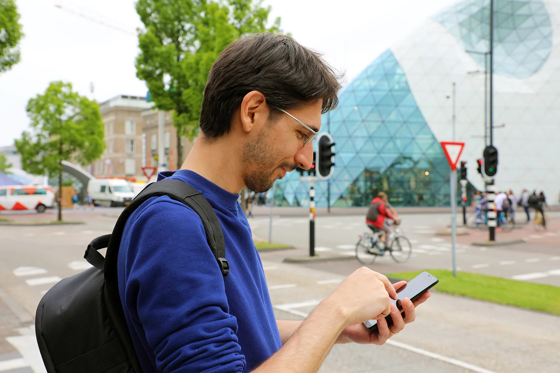 Man using his smartphone in Eindhoven