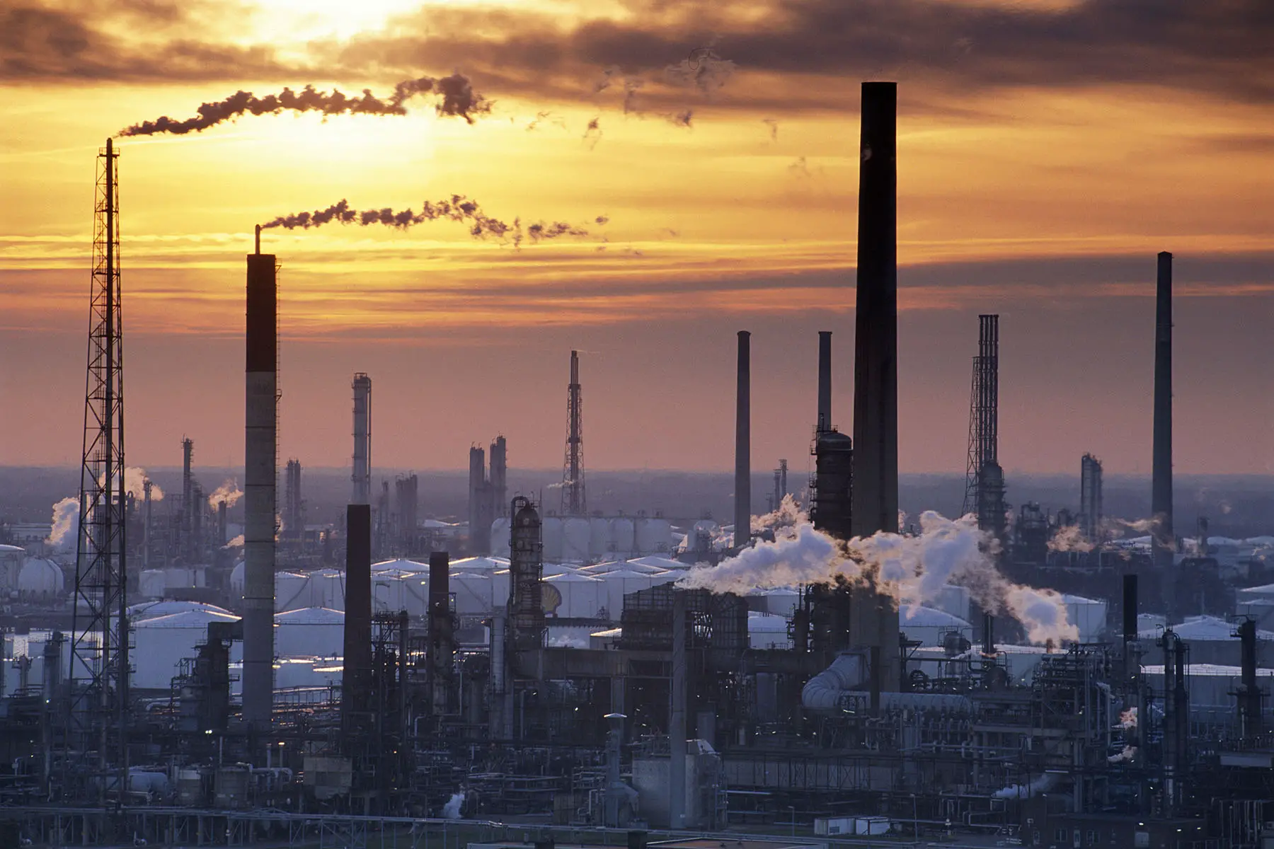 View of Shell refineries in Pernis, during dusk.