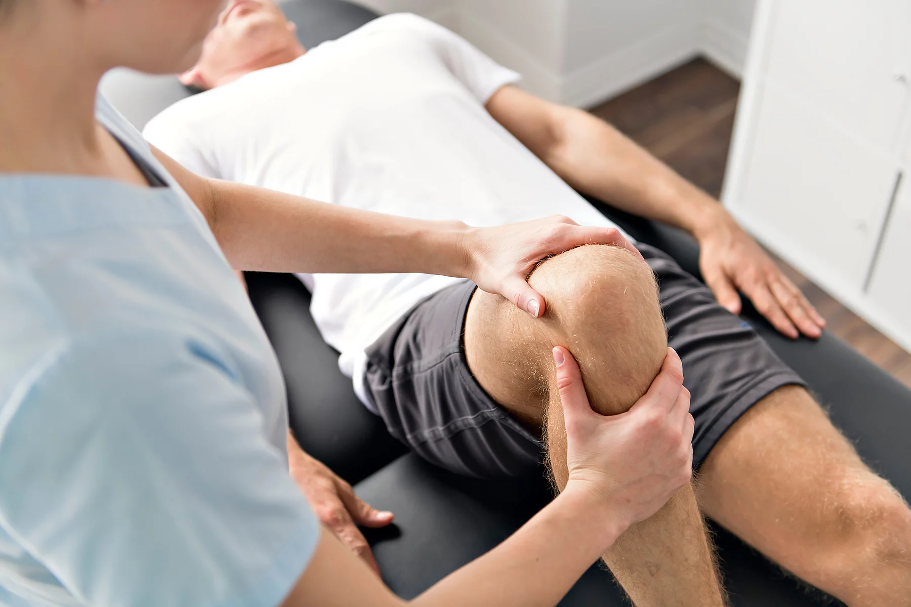 Physical therapist performing a massage