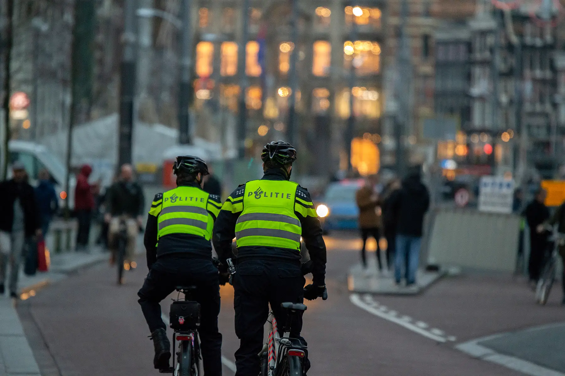 Police officers cycling in Amsterdam, the Netherlands