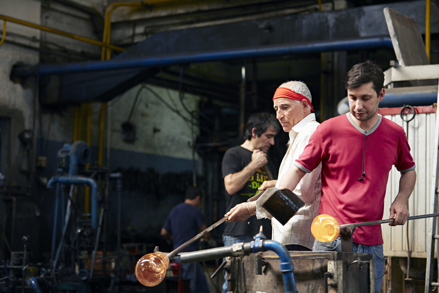 Glassblowers at work in Portugal.