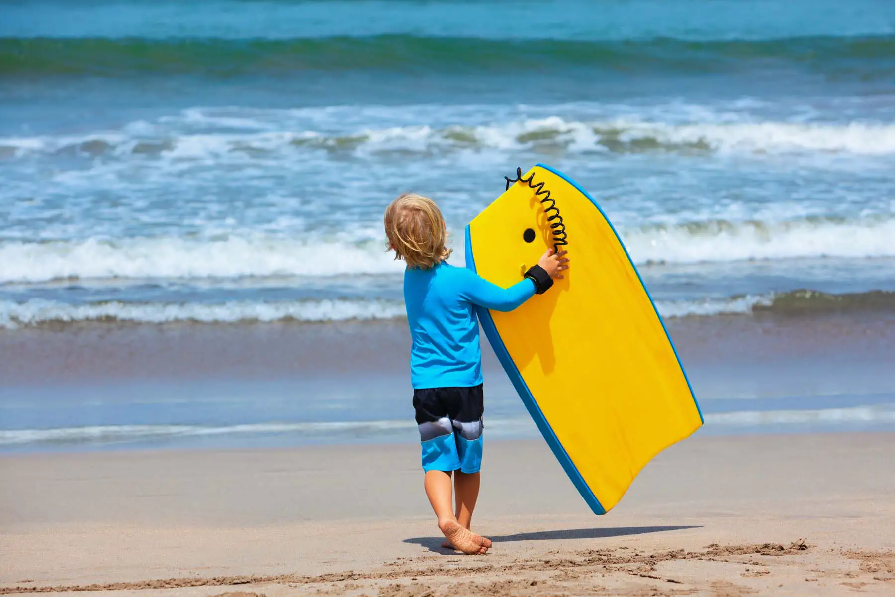 Boy with surf board