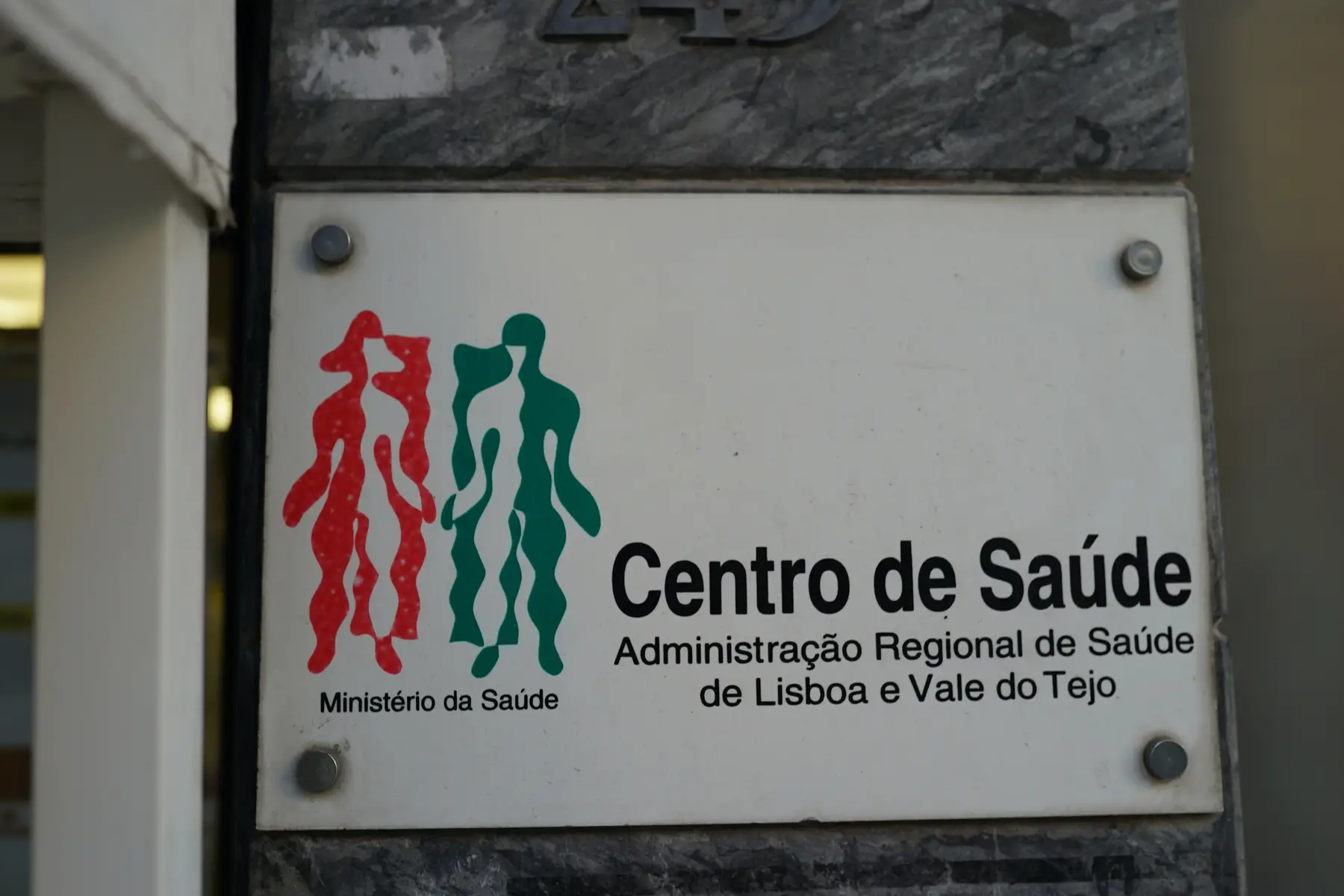 a sign for a health center (centro de saude) in Lisbon, Portugal