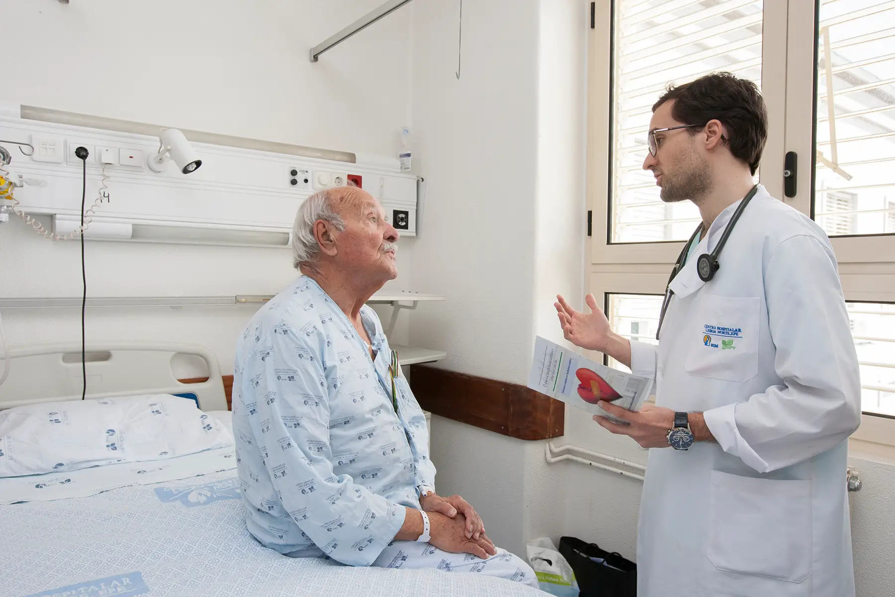 Doctor consulting a patient in Lisbon, Portugal