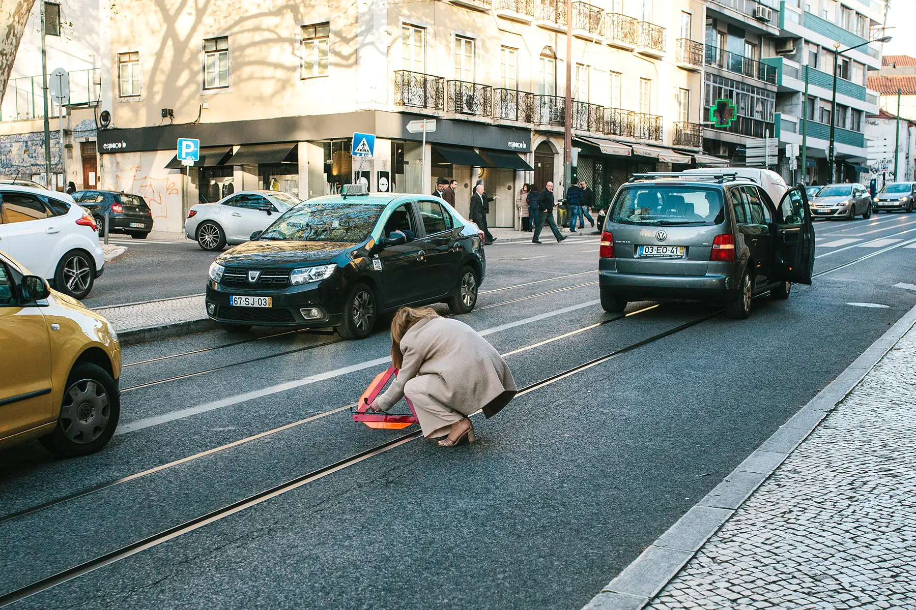 Driver sets up a warning sign after an accident in Lisbon, Portugal