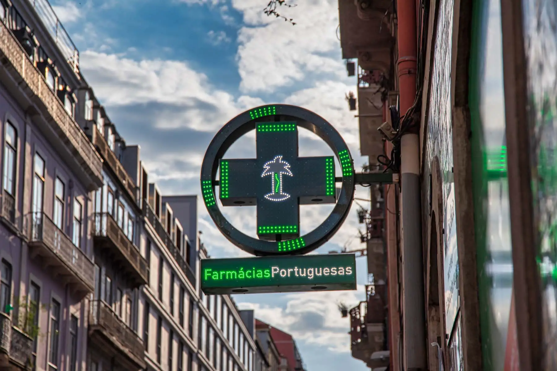 street sign of pharmacy in Lisbon