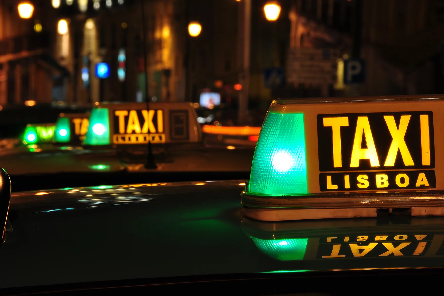A Lisbon taxi stand at night