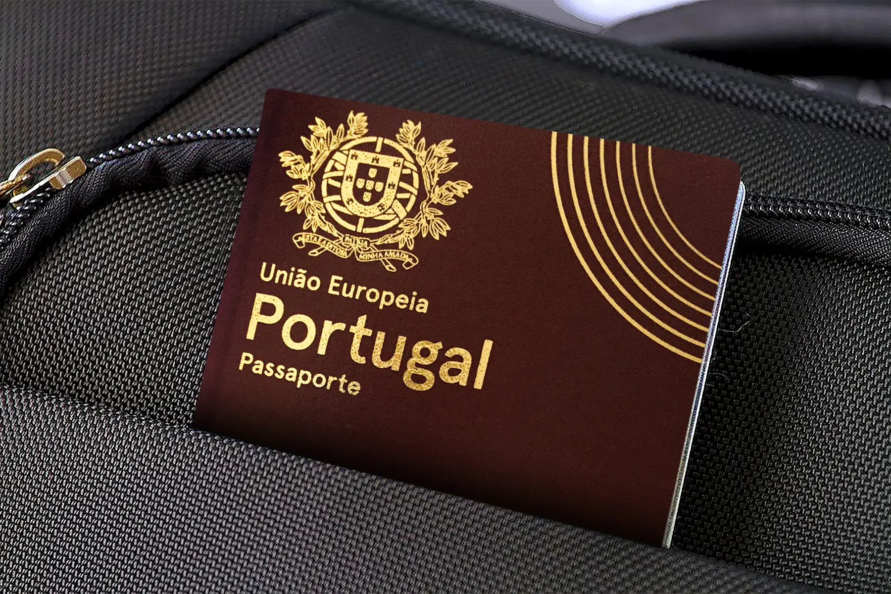 a Portuguese passport in a suitcase pocket