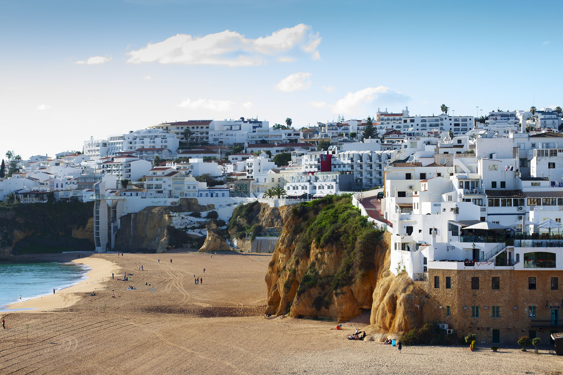 Beautiful sandy beach and sea side town of Albufeira in the Algarve province of Portugal.