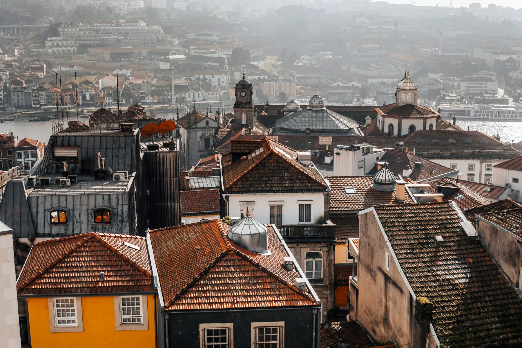 Rooftops of old buildings near the river in Oporto.