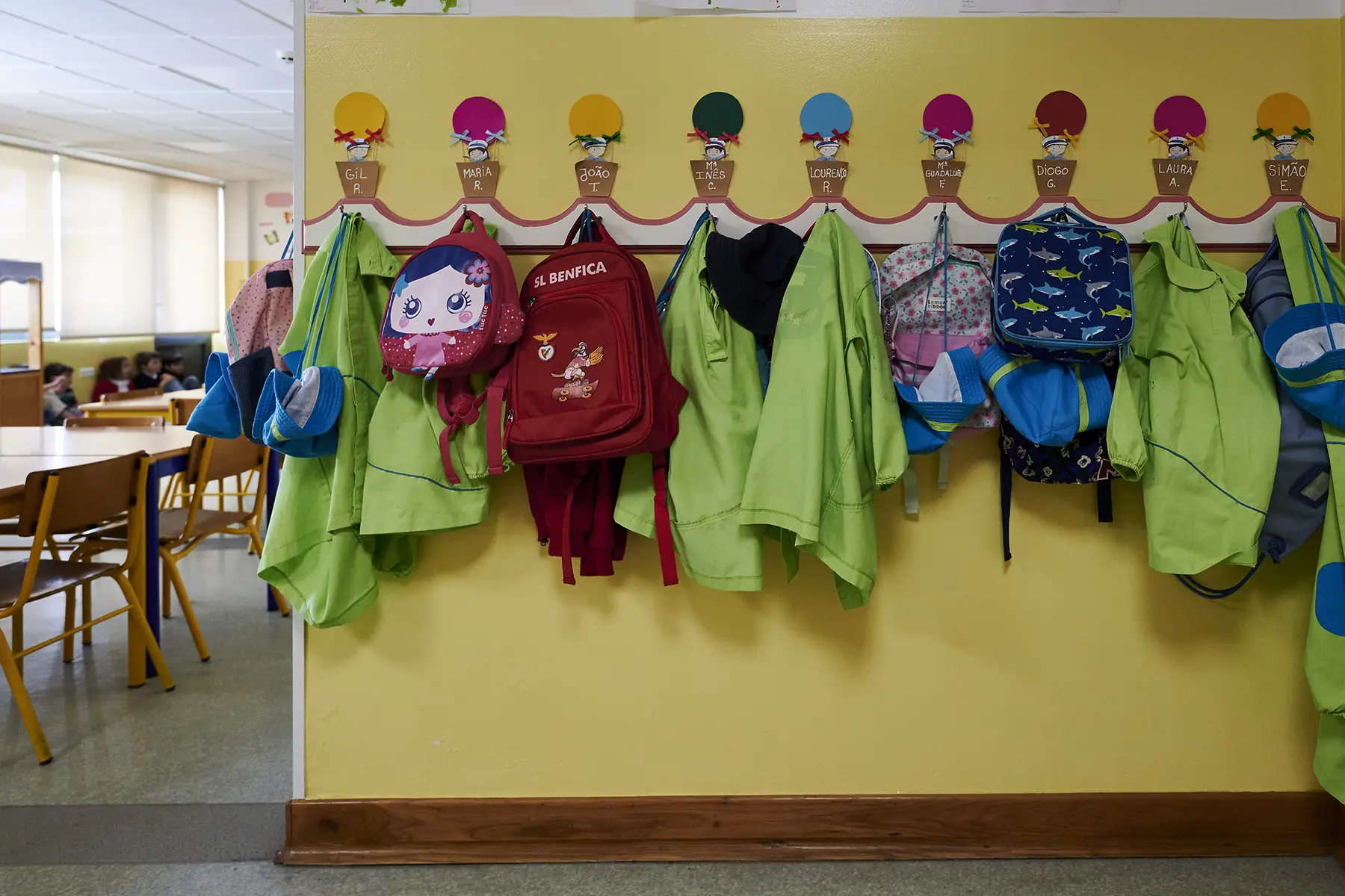 Student backpacks hanging outside a classroom in Campo Maior, Portugal