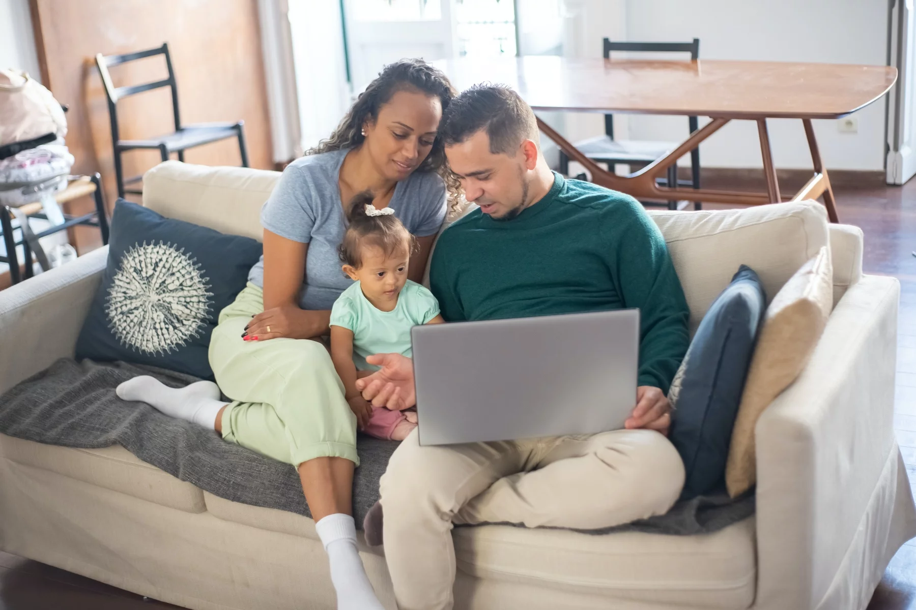 Family watching tv on laptop with a VPN