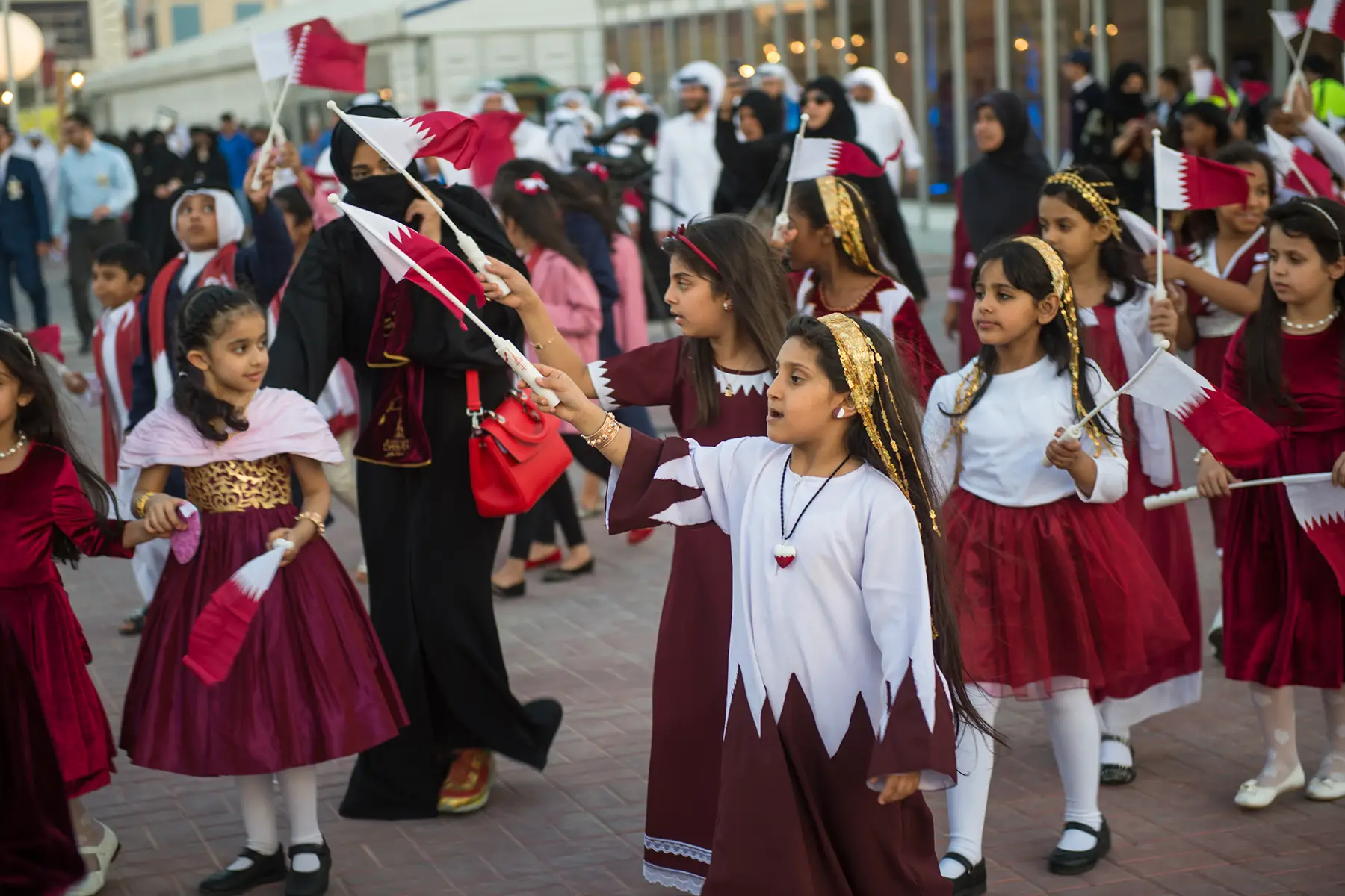 Children celebrating Qatar national day