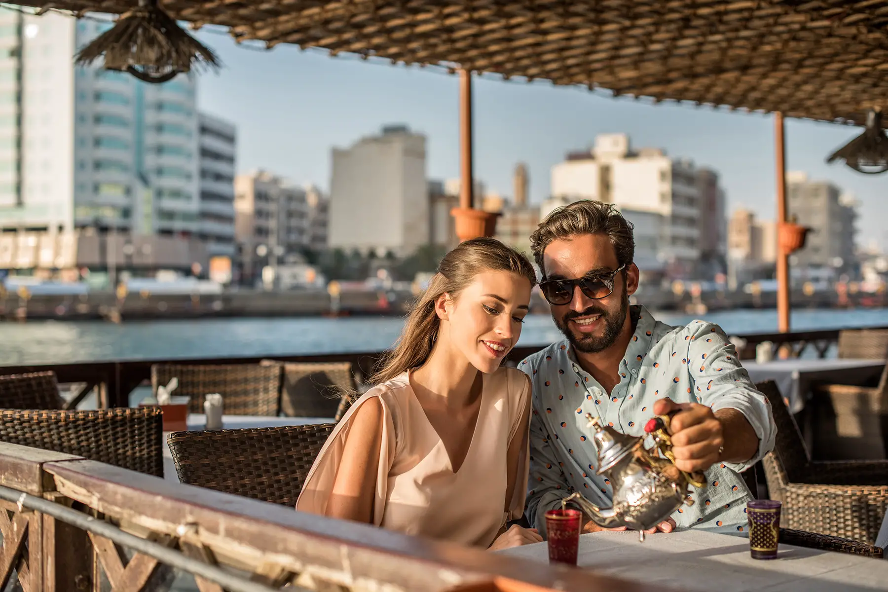Couple drinking tea together on a date in Dubai