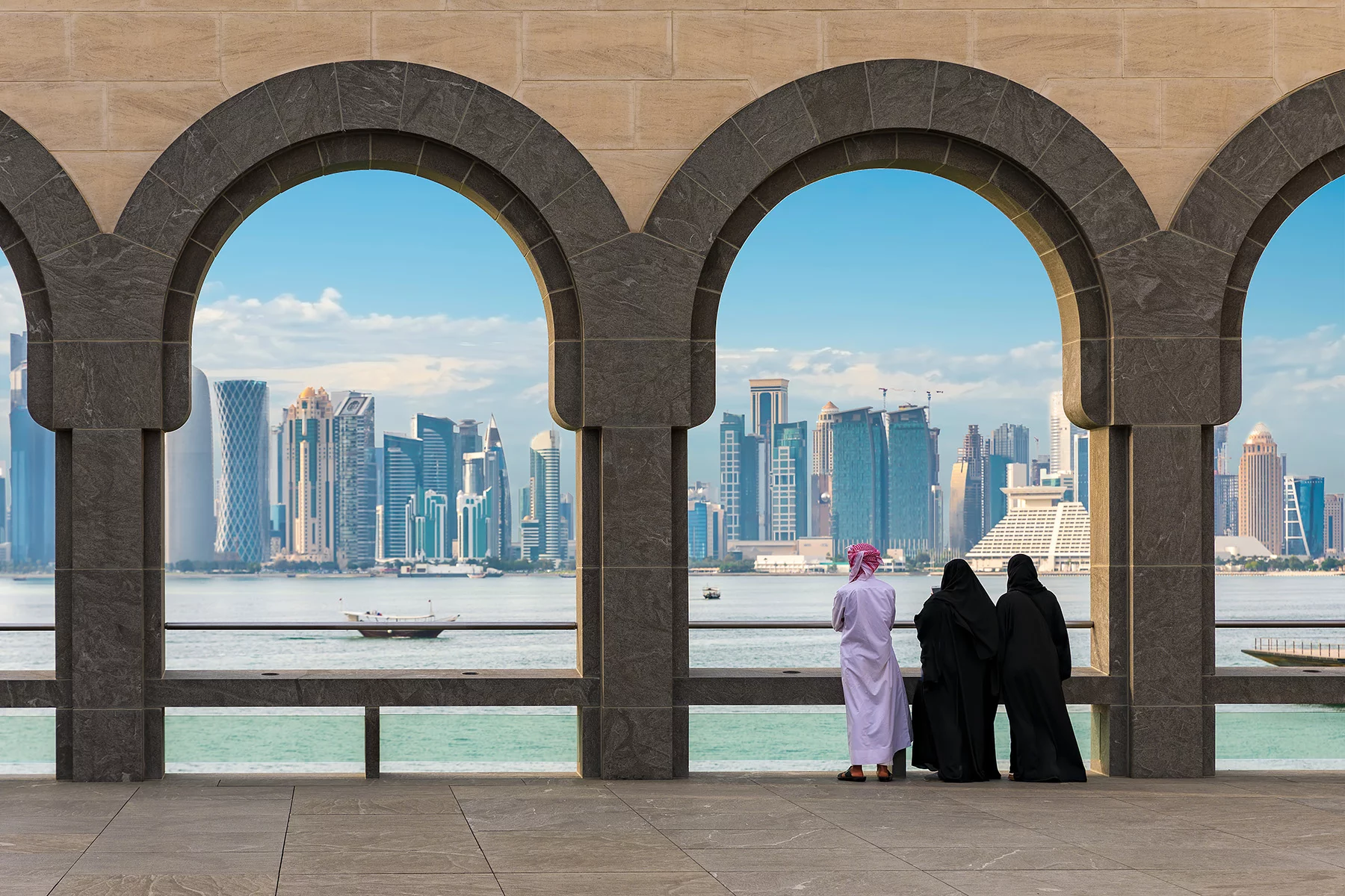 Qatari people wearing traditional dress