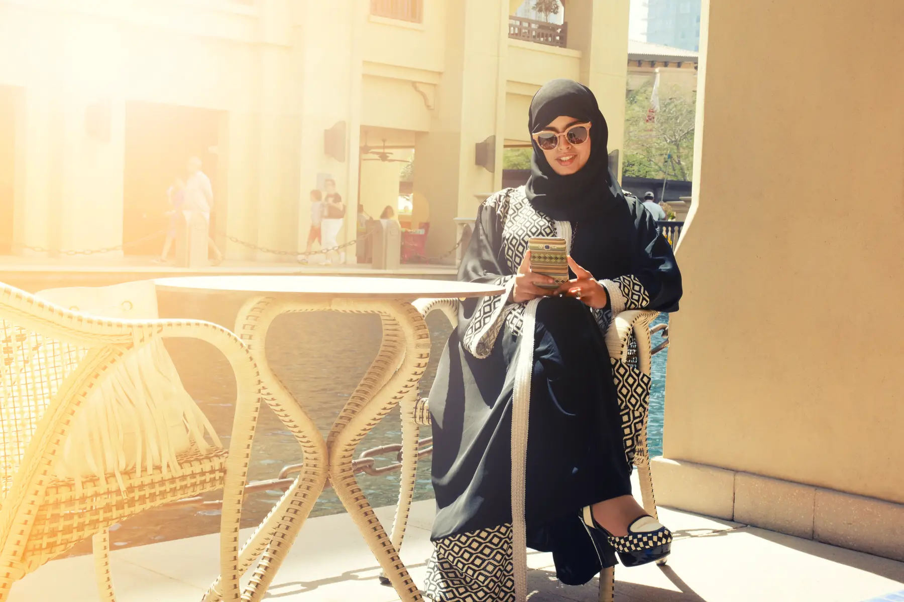 Qatari woman using her mobile phone