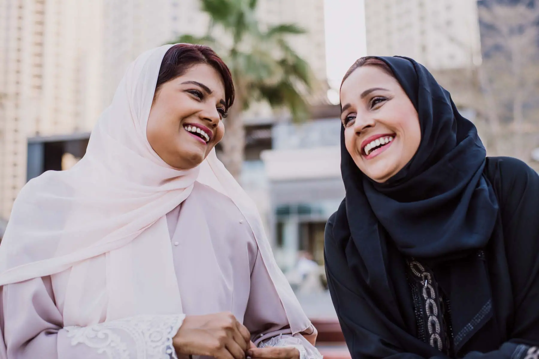 Qatari women chatting and smiling
