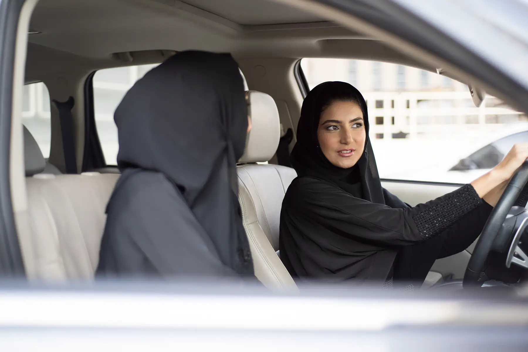 Women driving a car in Doha