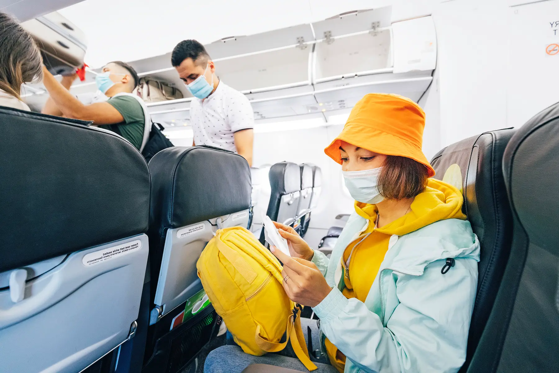 Airplane passengers wearing masks in Moscow during COVID-19 pandemic