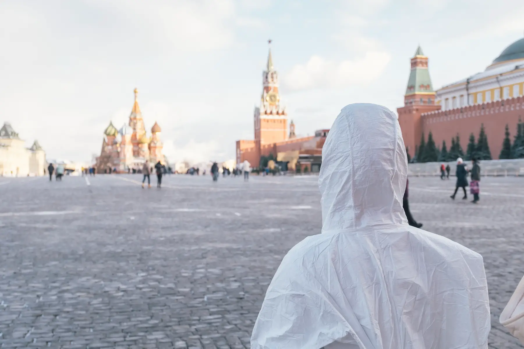 Russian healthcare worker in white coverall on Red Square in Moscow during COVID-19 pandemic